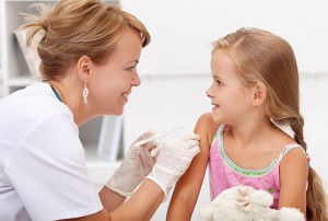 Brave little girl receiving injection