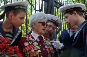 Russian navy cadets look at the medals o